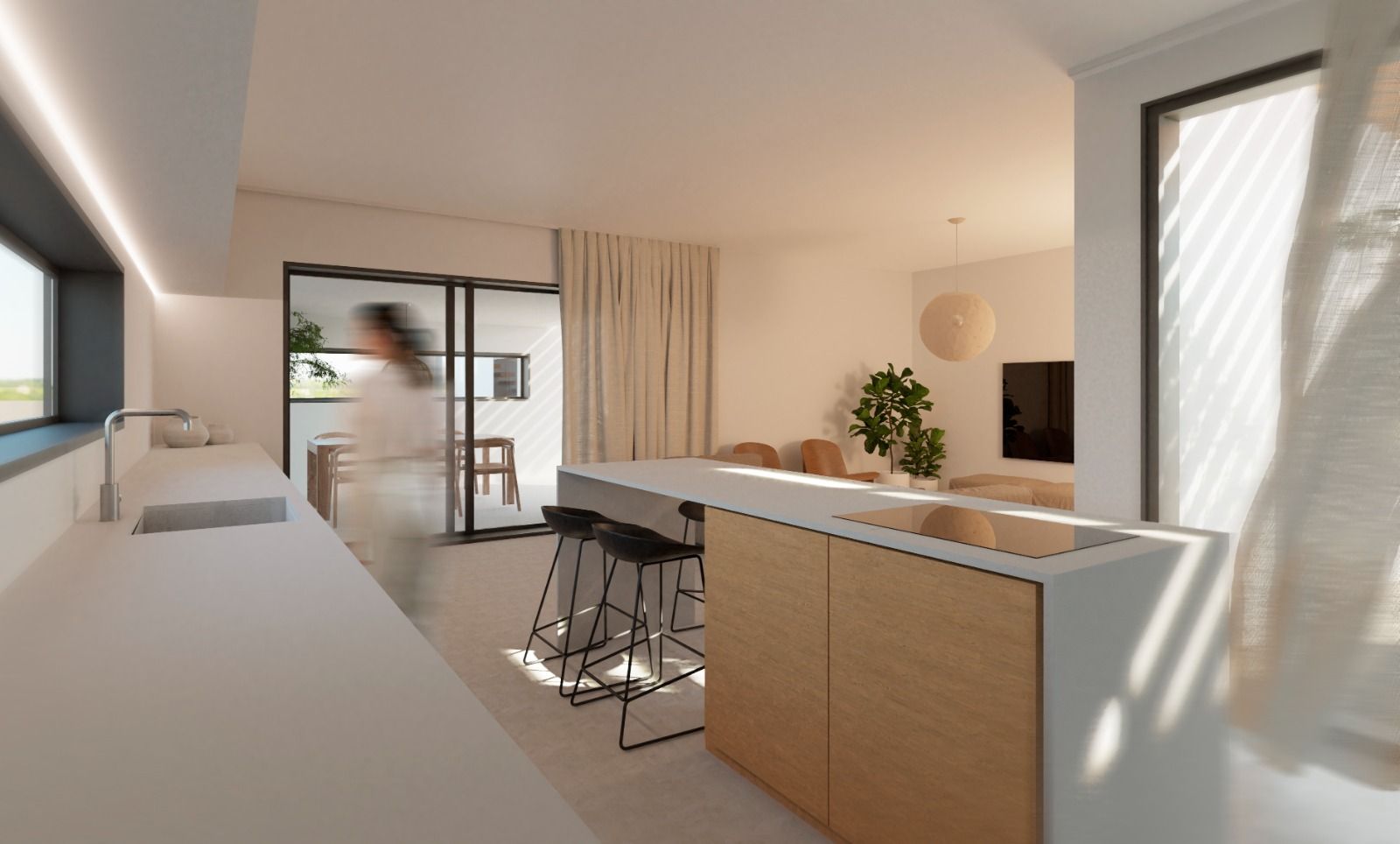 Cocina abierta con isla en vivienda reformada